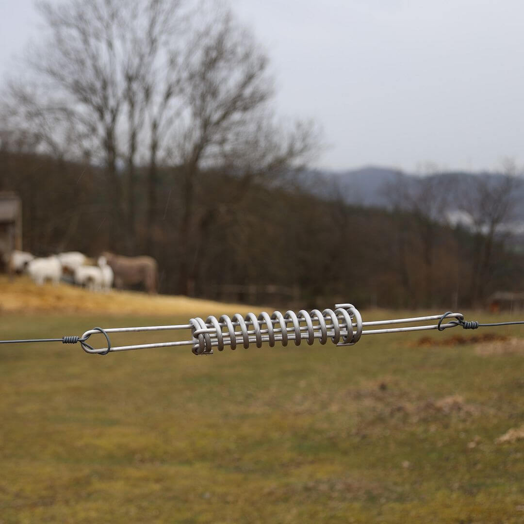 Dilatační napínací pružina pro vodiče elektrické ohrady, délka 200 mm
