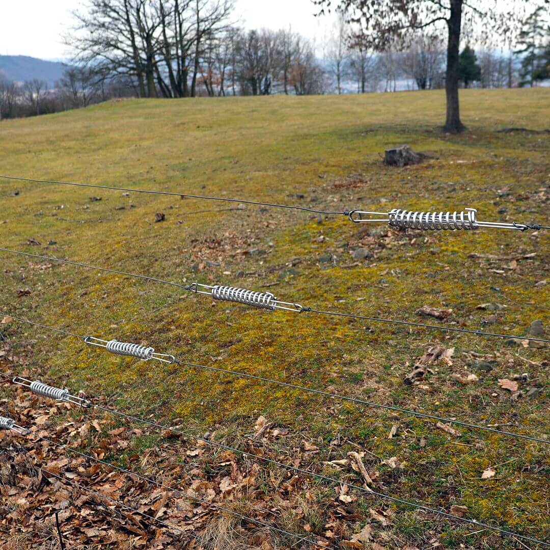 Dilatační napínací pružina pro vodiče elektrické ohrady, délka 200 mm
